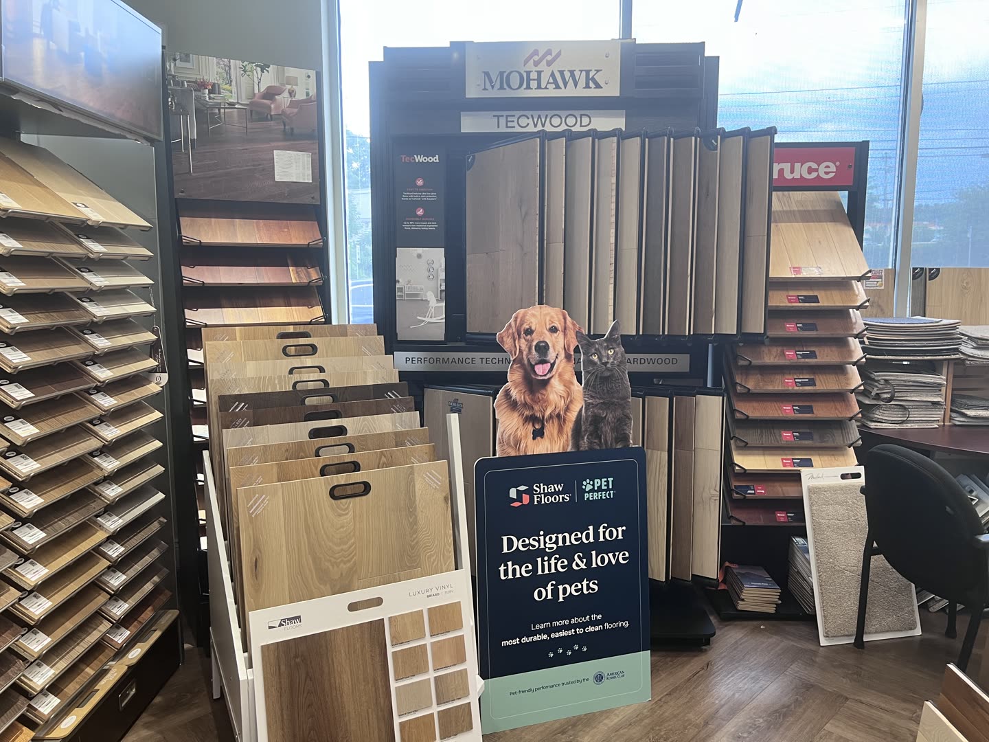 Pet-friendly waterproof flooring display at the Royalty Carpet & Flooring showroom in Wappingers Falls