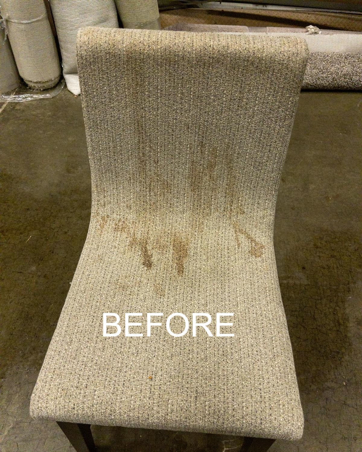 Upholstered dining chair with set-in stains before cleaning